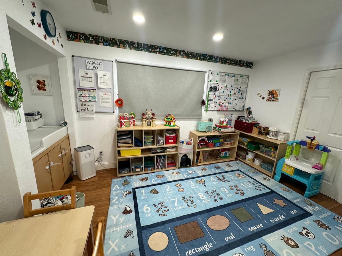 Classroom shelves stocked with books and learning materials